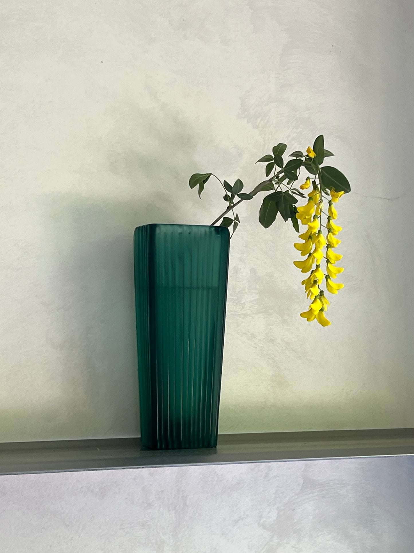 Greenish glass vase