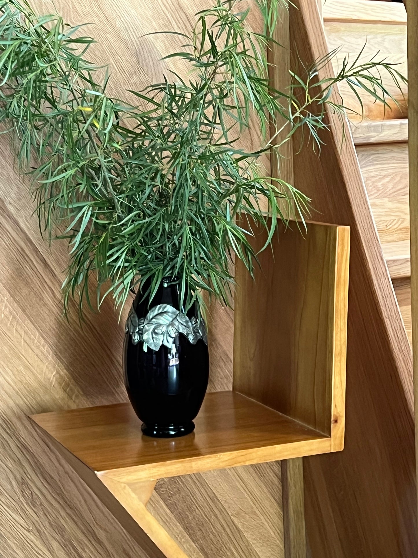Burgundy glass vase with steel decoration