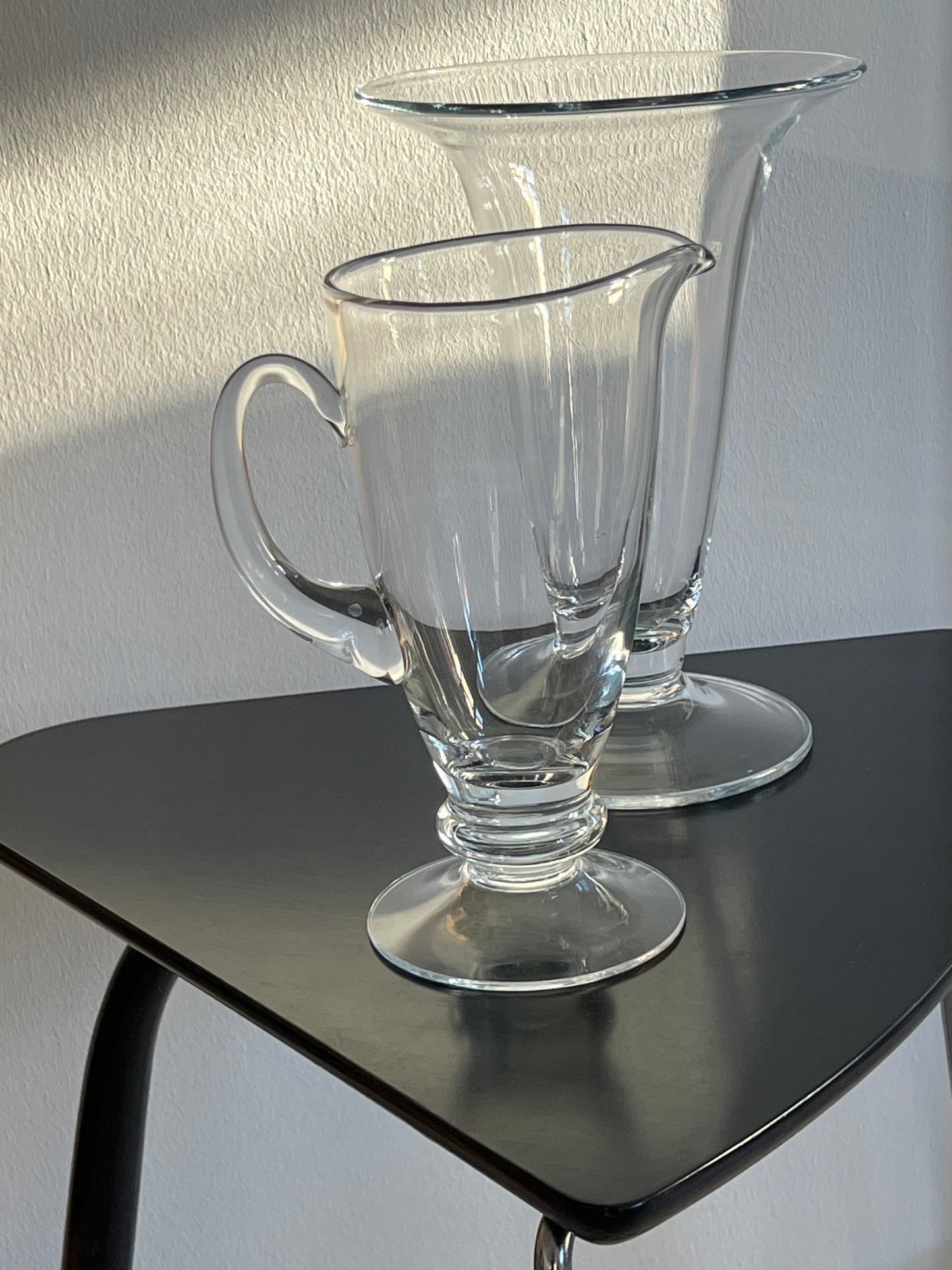 Curvy tall glass jug