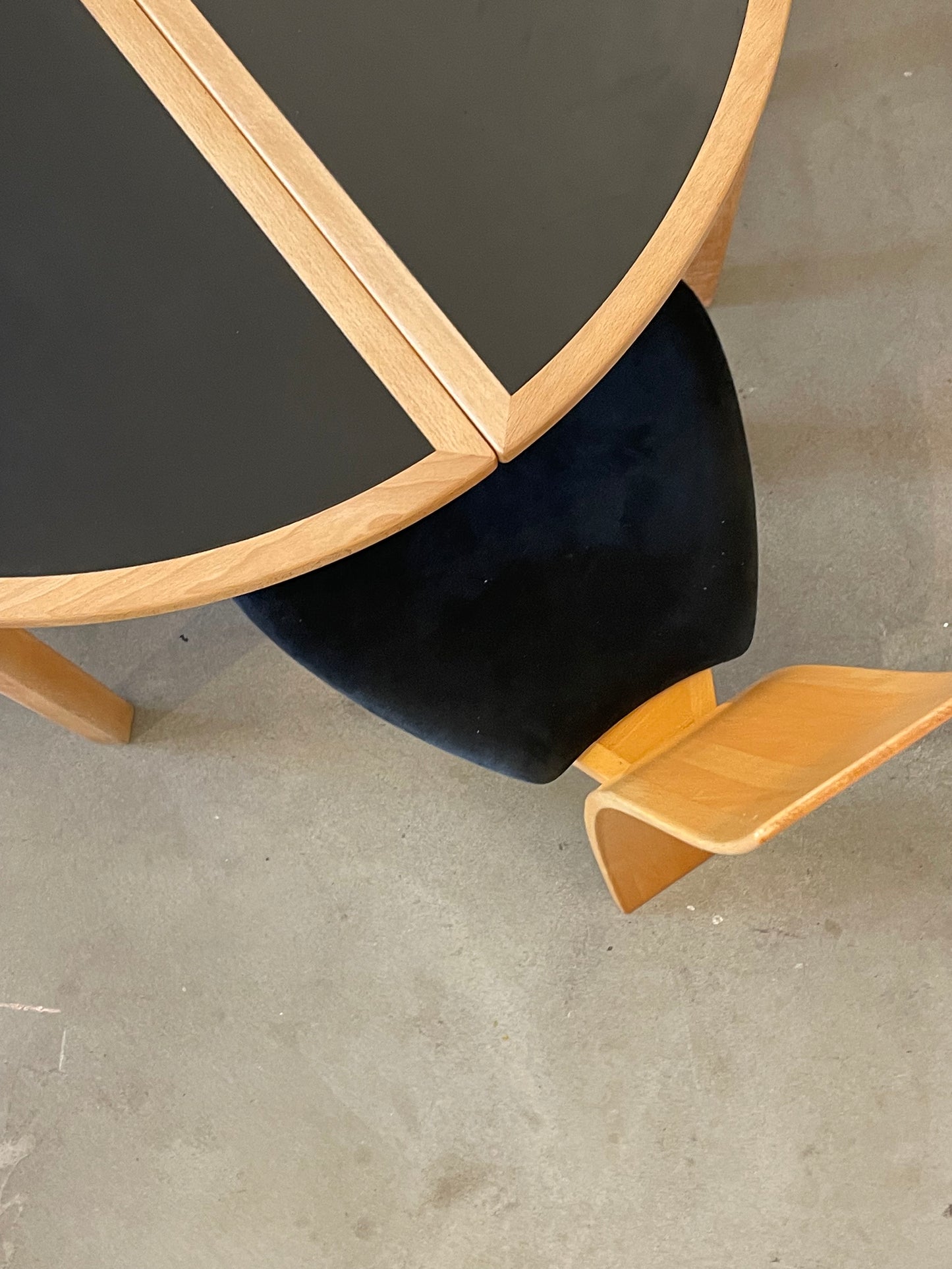 Circular dining table