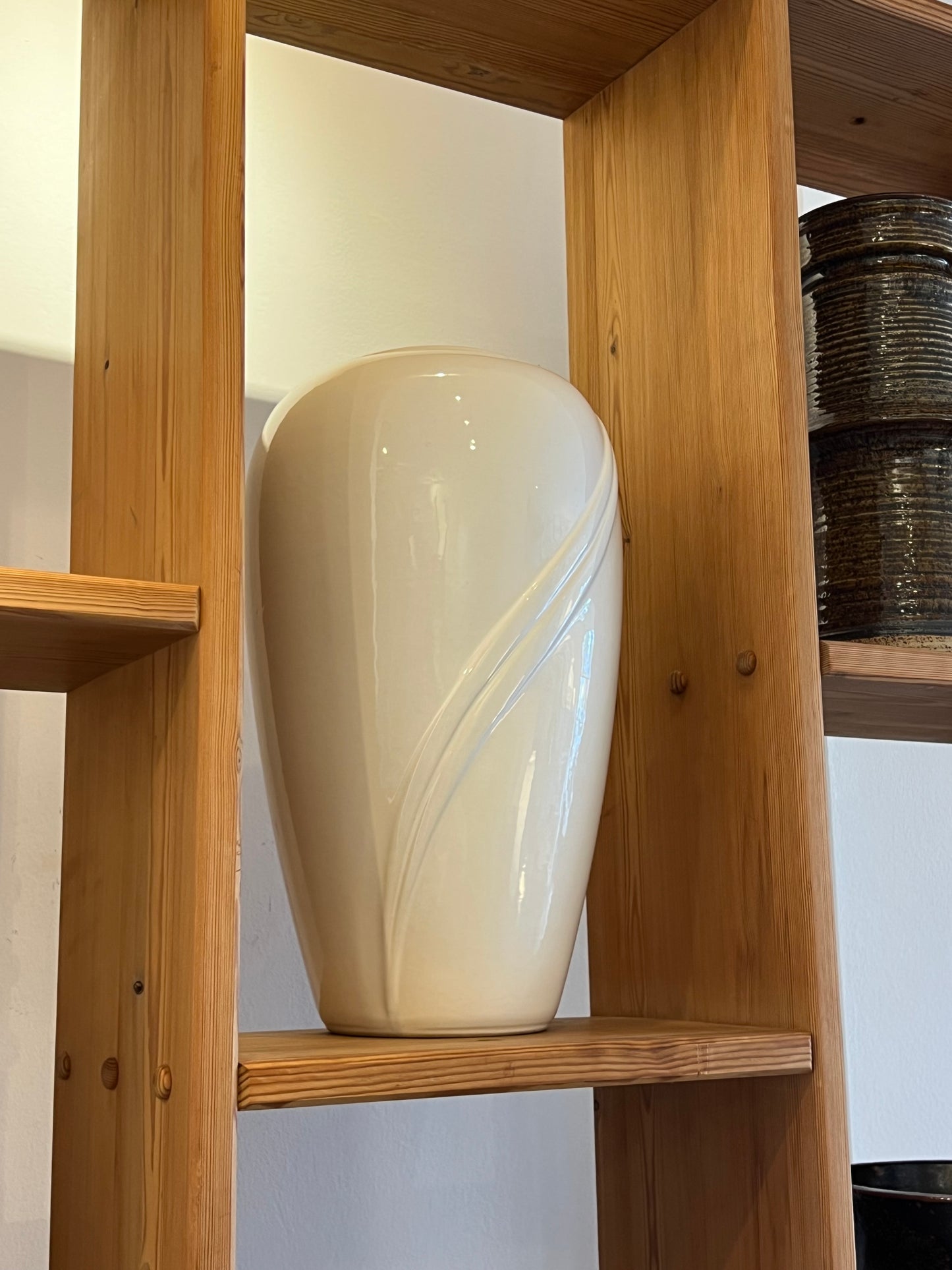 Tall white vase