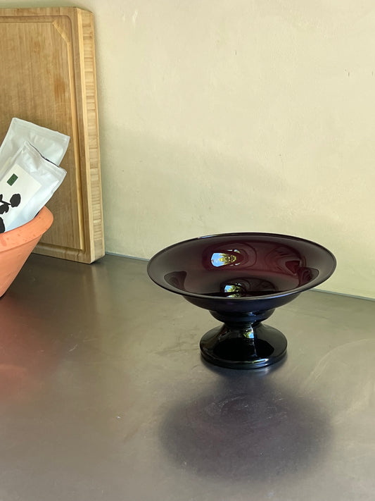 Burgundy glass bowl on foot