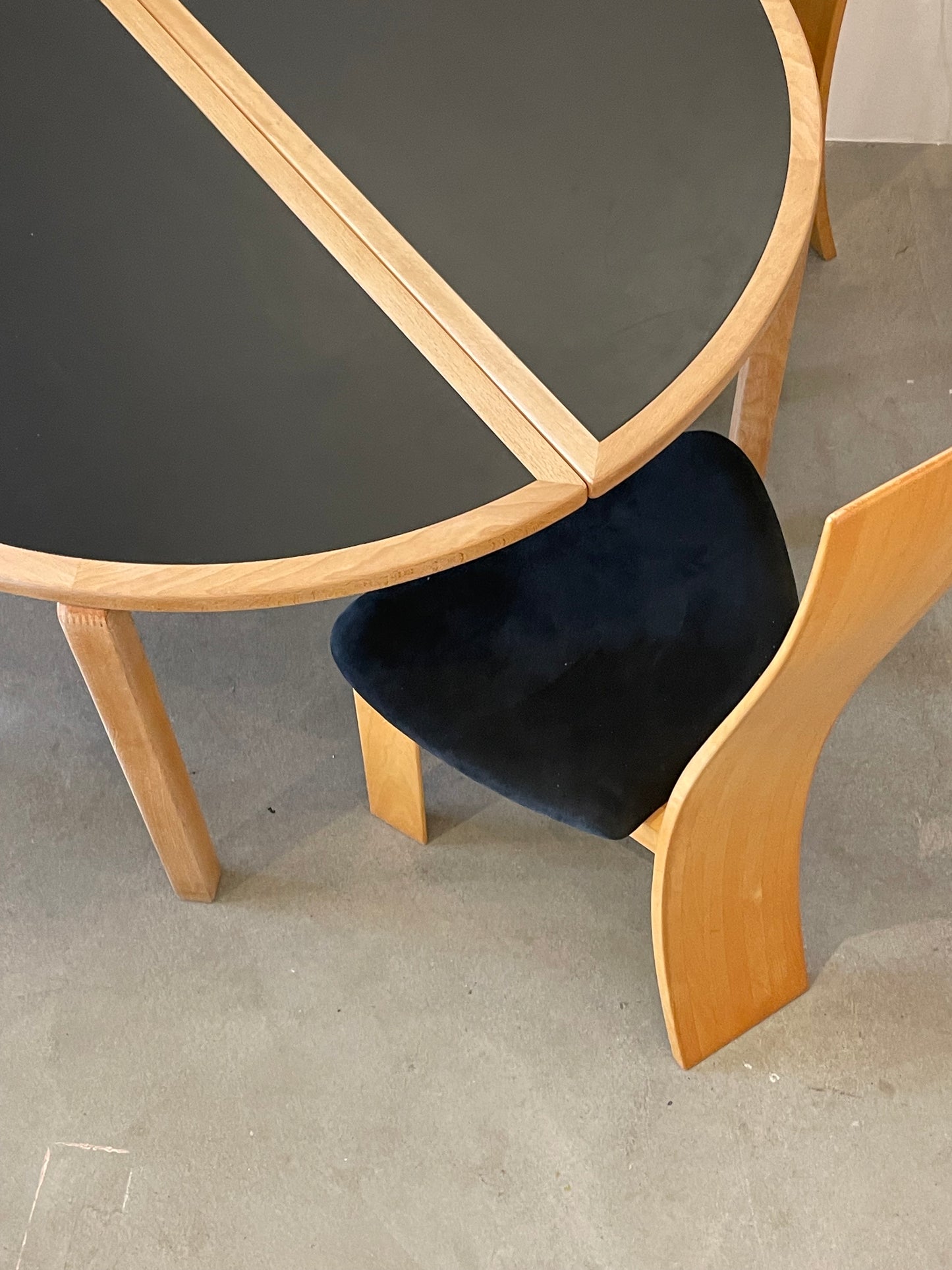 Circular dining table