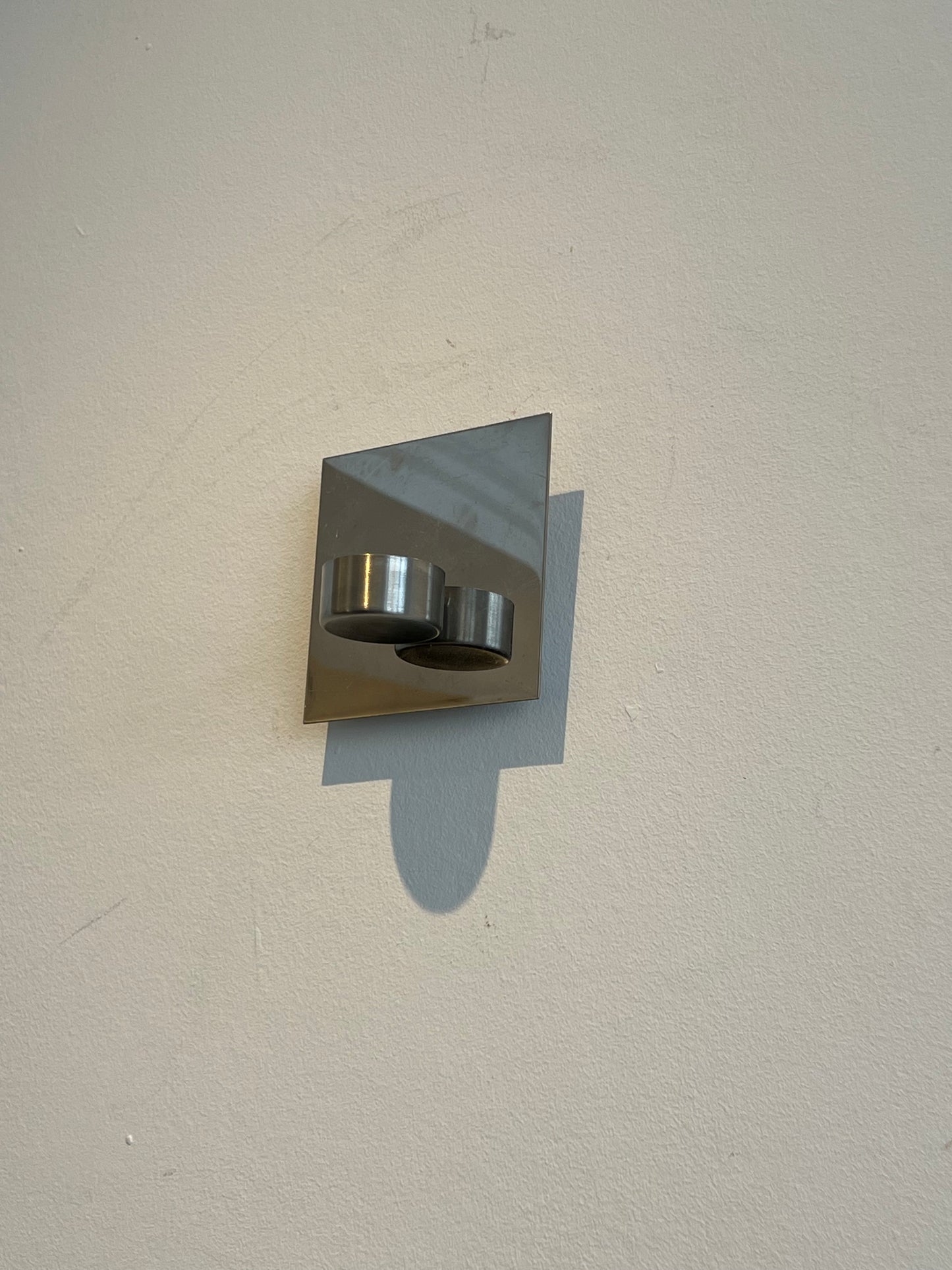 Hanging steel candle holder