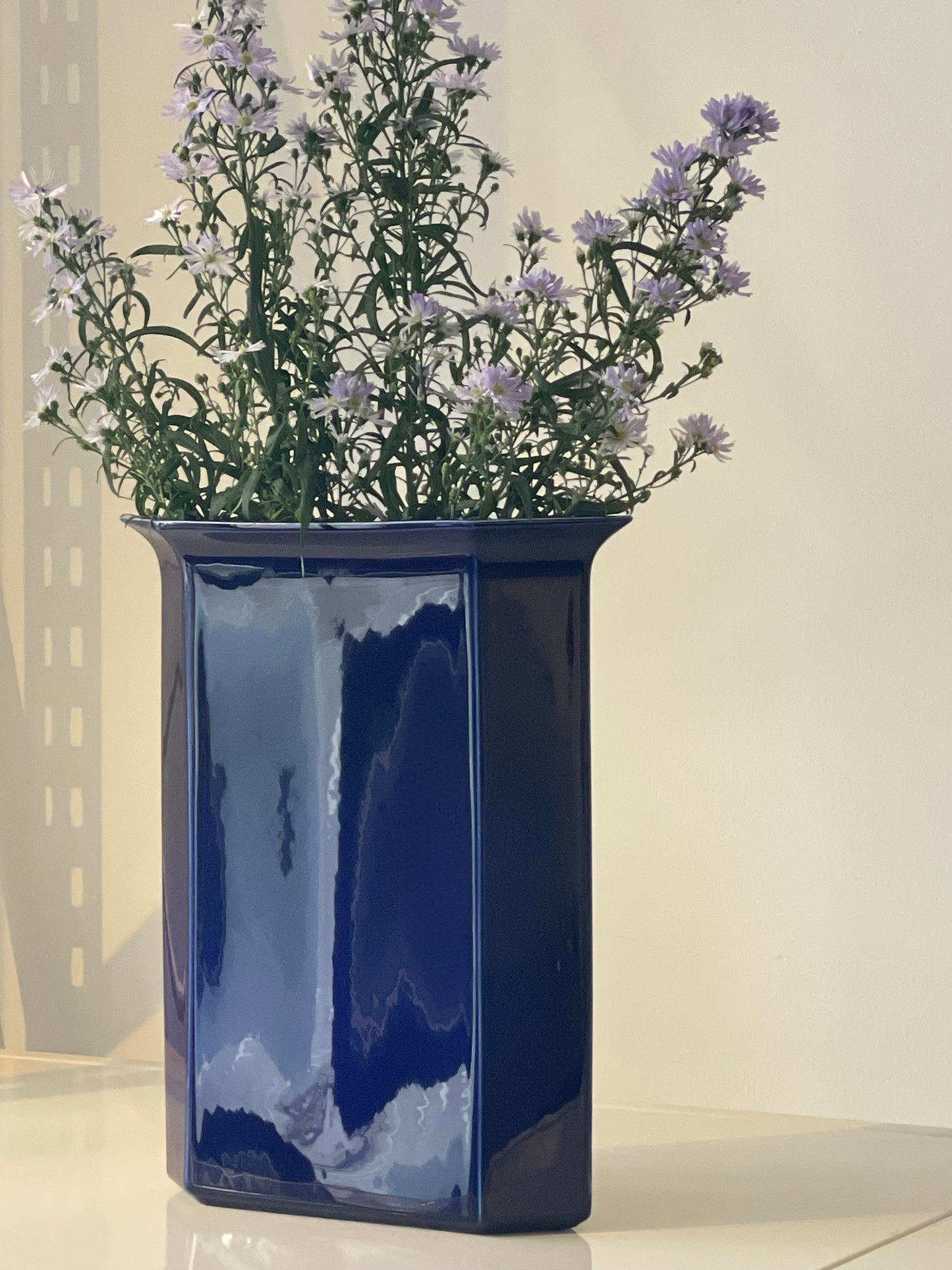 Tall blue vase
