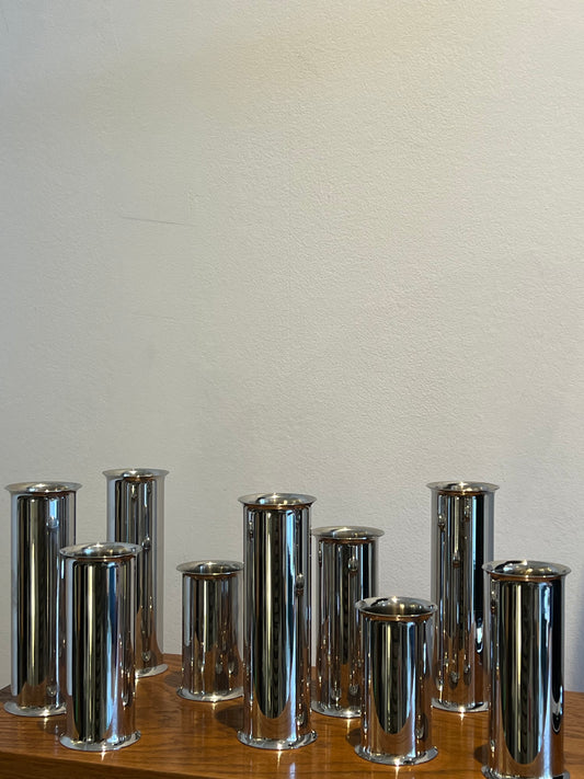 Steel vases/candle holders