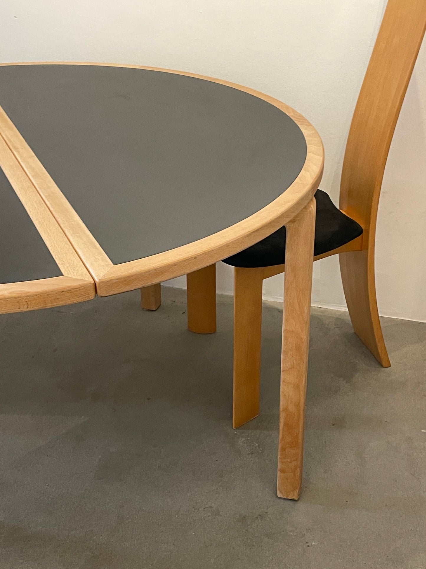 Circular dining table