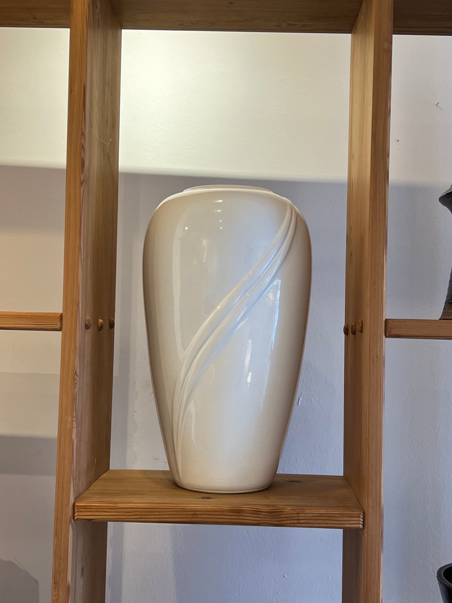 Tall white vase