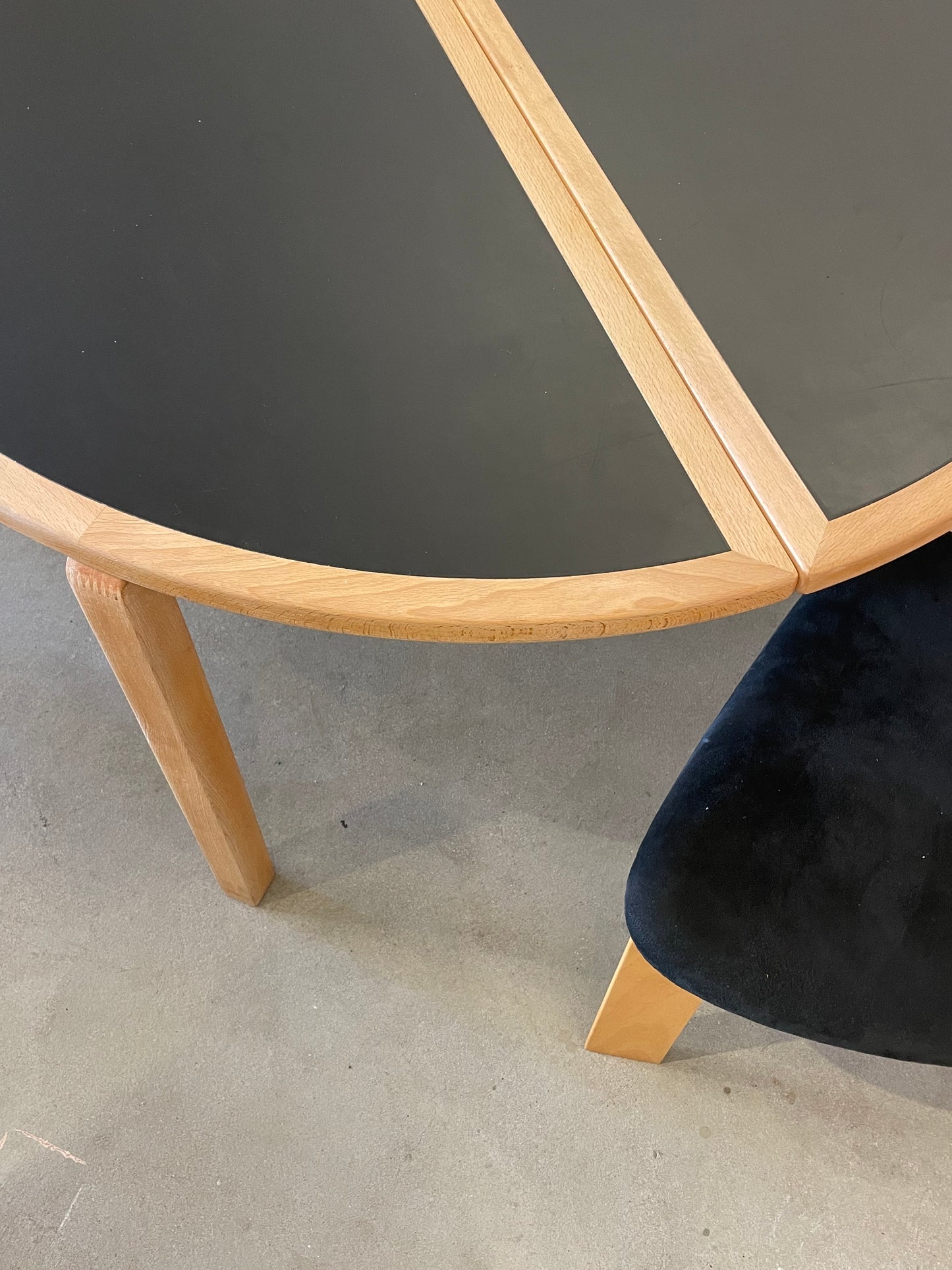 Circular dining table